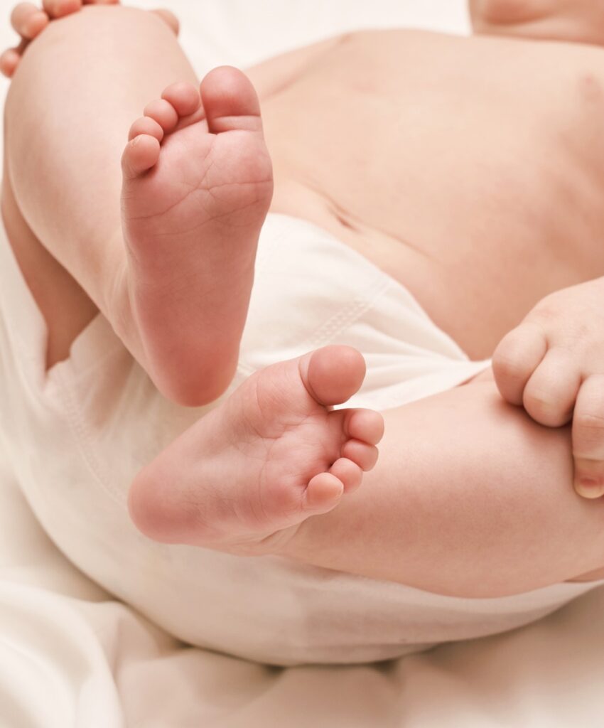 Little child feet. Toddler legs. Kid boxer panty. Baby person. Tiny health care